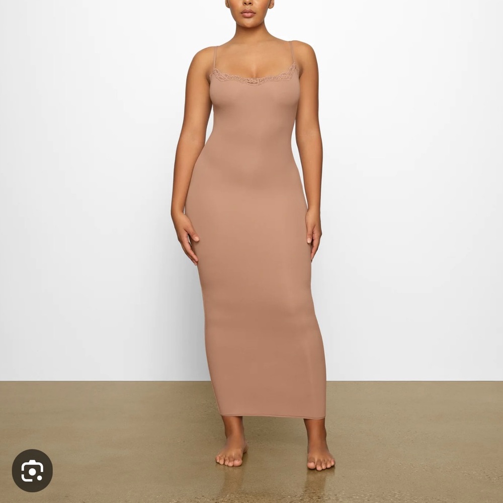 New w/ tags SKIMS long slip dress with lace detail. Ordered 2 by accident